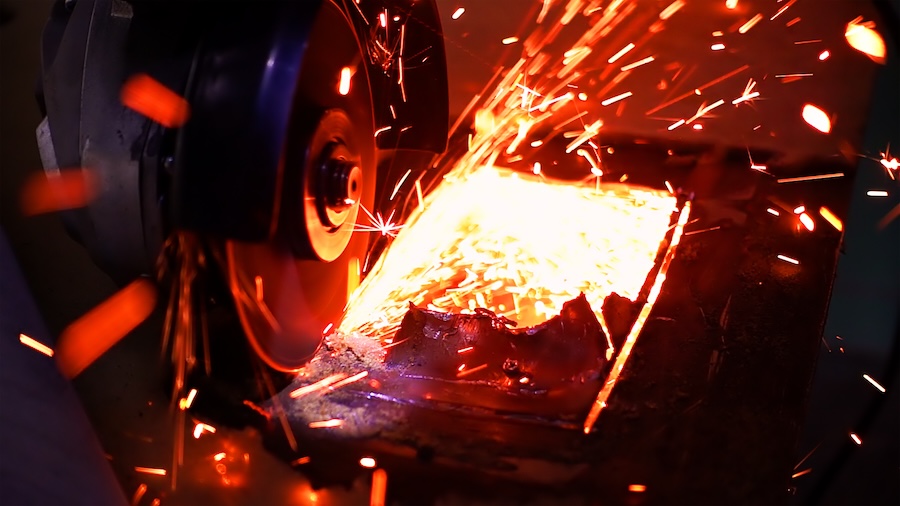 cutting metal with disc grinder with bright sparks 2026 01 06 09 43 30 utc